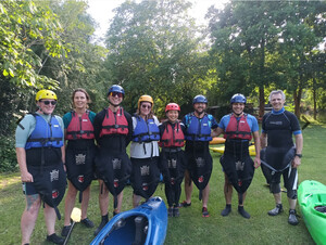 A group kitted up and ready to get on the water